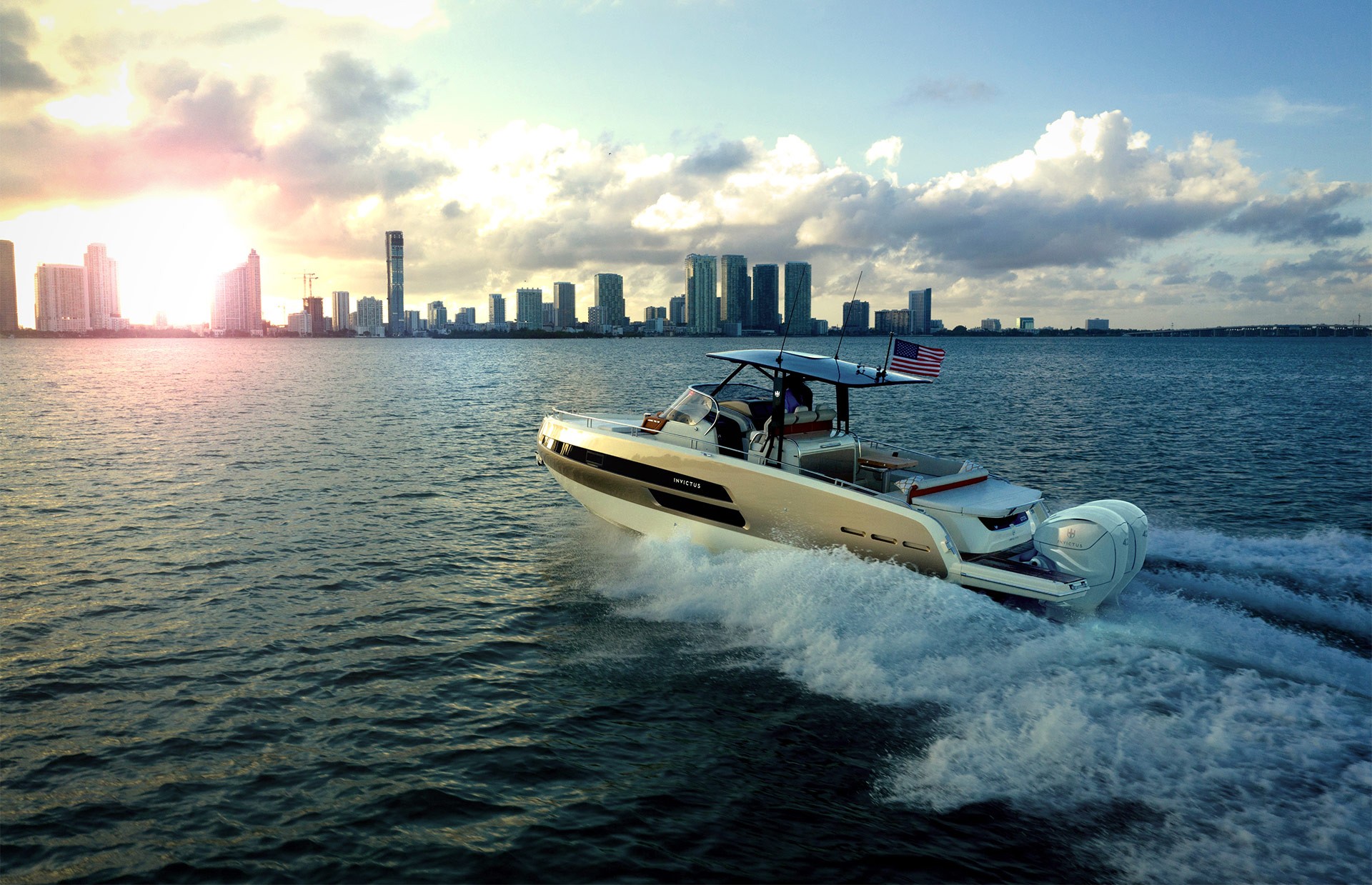 Invictus Yachts USA GT370S cruising at sunset toward city shoreline.